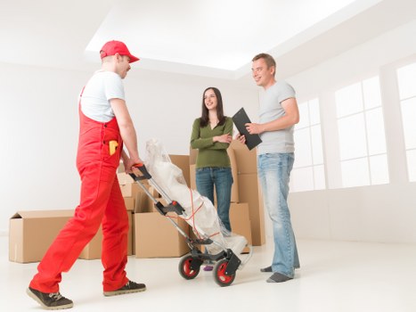 Moving sofa and wardrobe items in a Hornchurch property